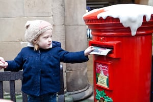 Shrewsbury resident Flora sends her letter to the North Pole for Santa.