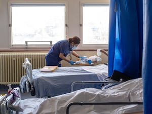 A general view of staff on a NHS hospital ward at Ealing Hospital in London.