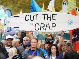 People protesting against sewage pollution by water firms earlier this year (Ben Whitley/PA)