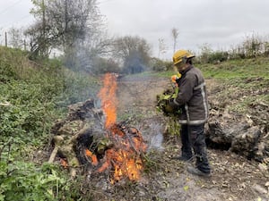 Former fireman, Howard is the best man for the job when it comes to burning material.