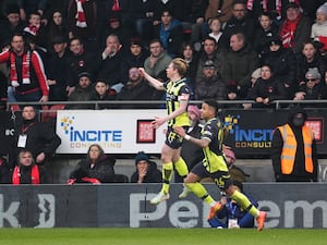 Kevin De Bruyne, left celebrates scoring