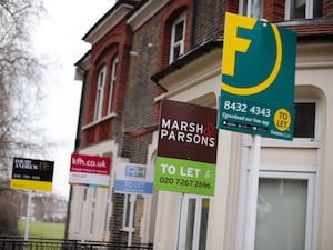 Row of rental signs on a street