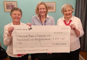 At a recent meeting of the Shrewsbury Branch of Parkinsons UK, two members of the Friday Singers presented a cheque for £344.60 , the proceeds of a Christmas Concert, to the chairwoman of the Shrewsbury Branch. From Left to right: Tricia Jones (Choir member) Maggie Connell (Chairwoman) and Lois Jones (Choir member).