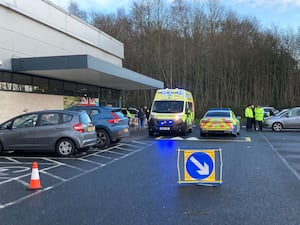 Ambulance and police are at the scene - in the Aldi car park off Holyhead Road.