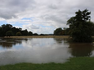 Floodwater covers parkland at Charlecote Manor in September