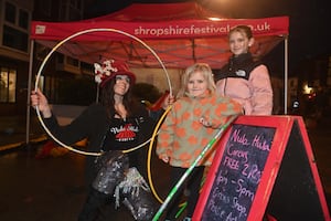 Performer, Nula with Connie Ainsworth, 4, and Amelia Ainsworth, 9 at Shifnal's Christmas lights switch-on