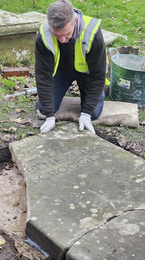 The stone being put back in place.