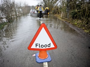 The Met Office has warned heavy rain is likely to cause travel disruption and flooding (Ben Birchall/PA)