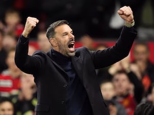 Manchester United interim manager Ruud van Nistelrooy celebrates with fists in the air