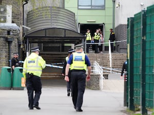 Police at Amman Valley school, in Ammanford (Ben Birchall/PA)