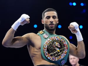 Galal Yafai poses with the belt after his WBC interim flyweight title victory over Sunny Edwards (not pictured)