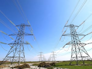 Two rows of pylons in the countryside