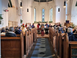 Kington Community Choir singing at the concert.