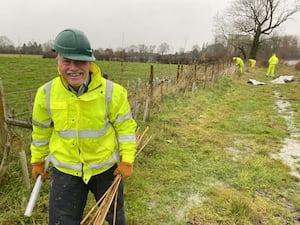 Saturday hedge planting. Volunteers did their best despite stormy weather. 