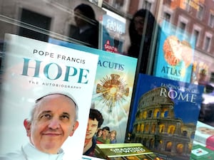 A book shop displays Pope Francis autobiography called Hope in Rome