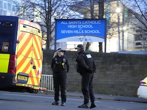 Police officers outside All Saints Catholic High School, on Granville Road in Sheffield