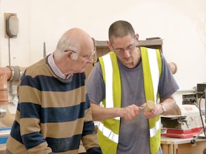 Ludlow Men's Shed helps and supports the members, Mark passing on his considerable woodworking skills.