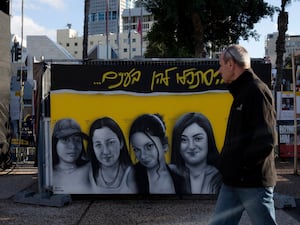 A mural of female Israeli soldiers held by Hamas