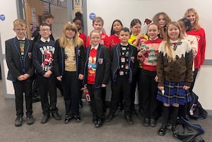 Burton Borough’s Christmas Jumper Day raised over £186 for Save The Children.