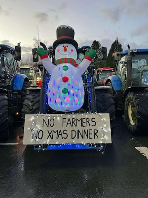 The second placed entry with a snowman and 'No Farmers No Xmas Dinner' sign