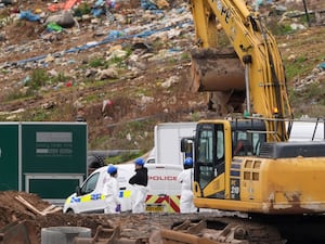 Police officers during the search of part of a landfill site in Essex for the body of a missing man who detectives believe was murdered