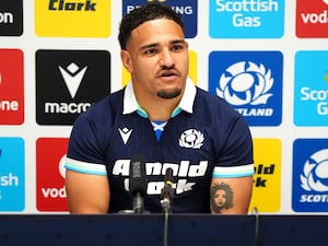 Sione Tuipulotu at a press conference