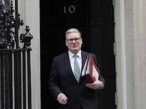 Sir Keir Starmer carrying files as he leaves 10 Downing Street