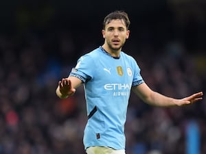 Manchester City’s Nico Gonzalez holds his arms out wide