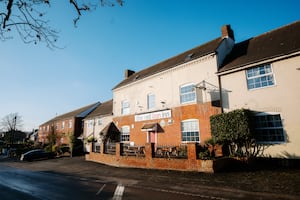 The Red Lion Inn sits at the centre of the village