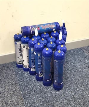 Police are appealing for information after nitrous oxide containers were found Broseley. Picture: West Mercia Police. 