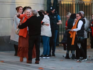 Family and friends of Ian Ogle outside Laganside Courts, Belfast, after Walter Ervine, Glenn Rainey and Robert Spiers were found guilty of Ian’s murder in Belfast in January 2019