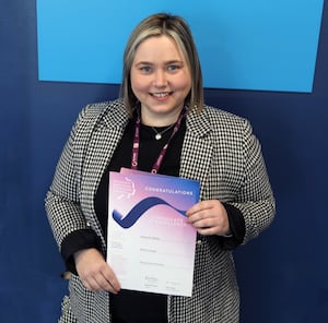  Samantha Bailey with her certificate from the 2024 Pearson National Teaching Awards
