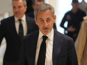 Nicolas Sarkozy arrives at court