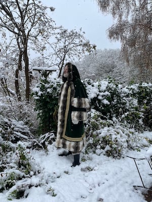 Father Christmas looking out over snowy Kinver.