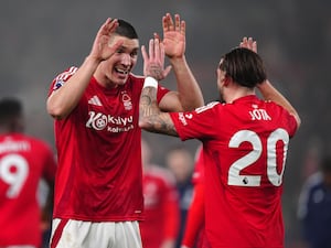 Nottingham Forest’s Jota Silva and Nikola Milenkovic celebrate their win over Tottenham