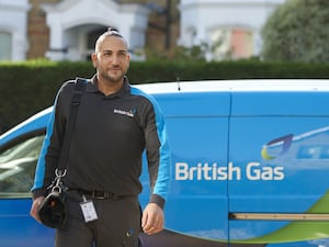 British Gas engineer in front of van