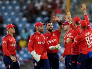 Saqib Mahmood (centre) celebrates a wicket