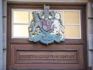 The crest of the Royal Courts of Justice in Belfast