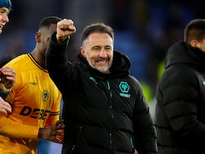 Vitor Pereira punches the air in celebration after Wolves' win at Leicester