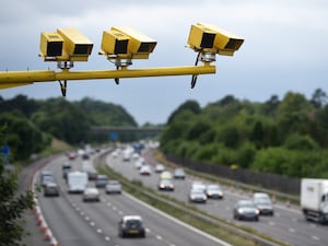 Speed cameras above a motorway