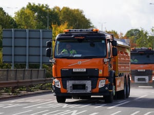 National Highways gritters driving on a road