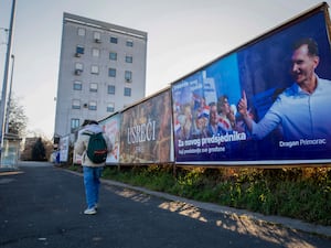 A campaign poster of residential candidate Dragan Primorac hangs ahead of the presidential election in Zagreb