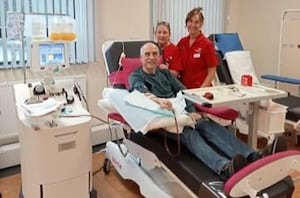 Chris Jones (Gus), from Rhayader, giving his 500th blood donation at the Welsh Blood Service Centre in Pontyclun (Image: Supplied)