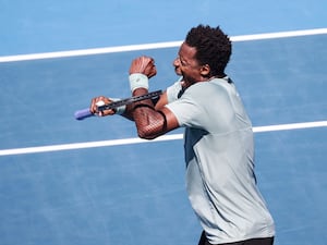 Gael Monfils reacts after defeating Zizou Bergs