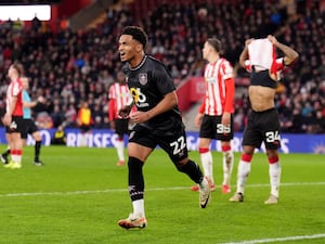 Marcus Edwards celebrates scoring