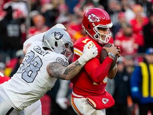 Las Vegas Raiders defensive end Maxx Crosby attempts to sack Kansas City Chiefs quarterback Patrick Mahomes