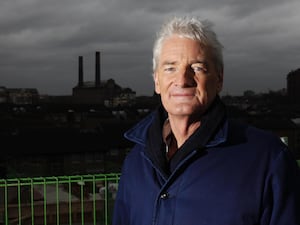 Sir James Dyson at the top of the Royal College of Arts building in Battersea, south-west London, in 2011