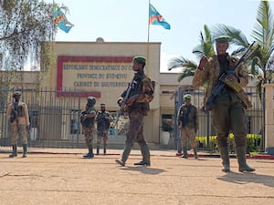 M23 rebels guarding a building in Bukavu