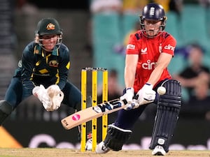 England skipper Heather Knight (right) is trapped in front by Australia’s Alana King during the Women’s Ashes T20 match in Sydney