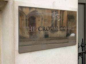 Brass sign outside Bristol Crown court